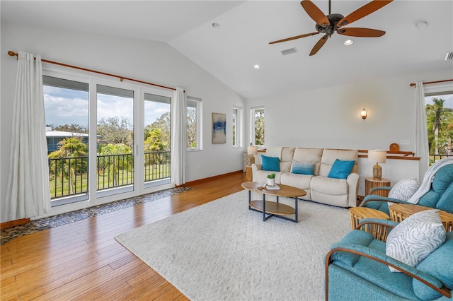 living room with recessed lighting, wood finished floors, visible vents, a ceiling fan, and vaulted ceiling