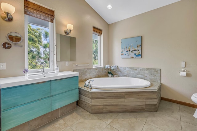 full bathroom featuring vaulted ceiling, tile patterned floors, a garden tub, and a healthy amount of sunlight