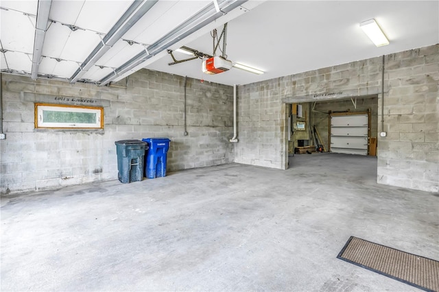 garage featuring a garage door opener