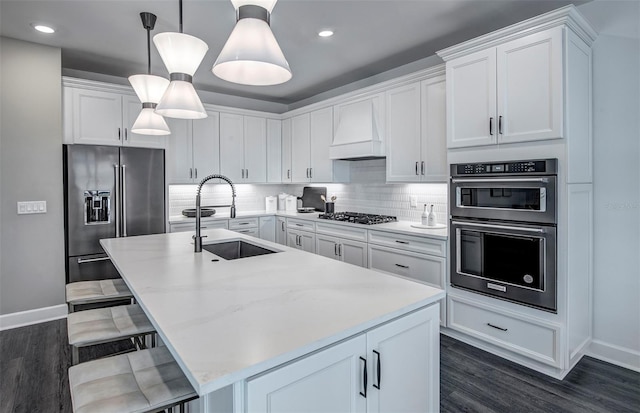 kitchen featuring premium range hood, high quality fridge, backsplash, and double wall oven