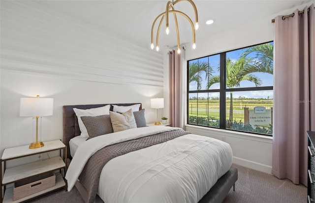 bedroom with carpet and baseboards