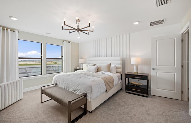 bedroom featuring light carpet, visible vents, a notable chandelier, and recessed lighting