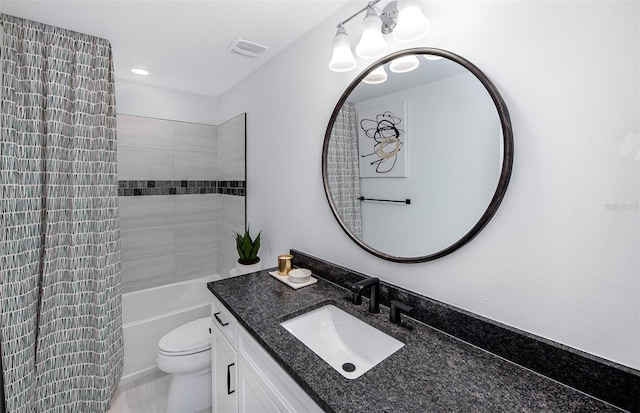 bathroom with washtub / shower combination, visible vents, vanity, and toilet