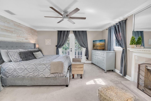 bedroom with access to outside, french doors, visible vents, and crown molding