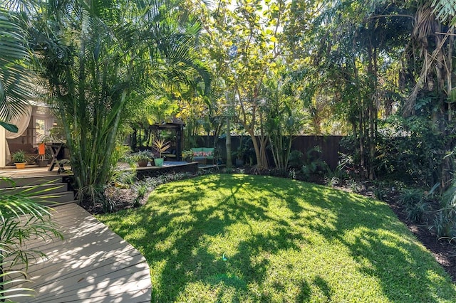 view of yard with fence