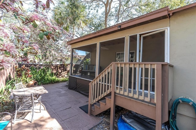 view of patio / terrace featuring fence