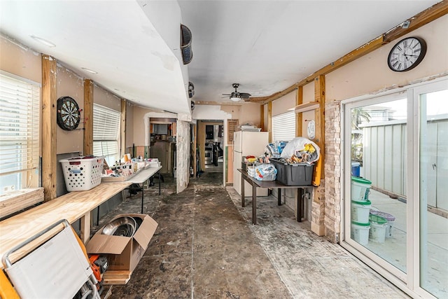 interior space with a healthy amount of sunlight and a ceiling fan