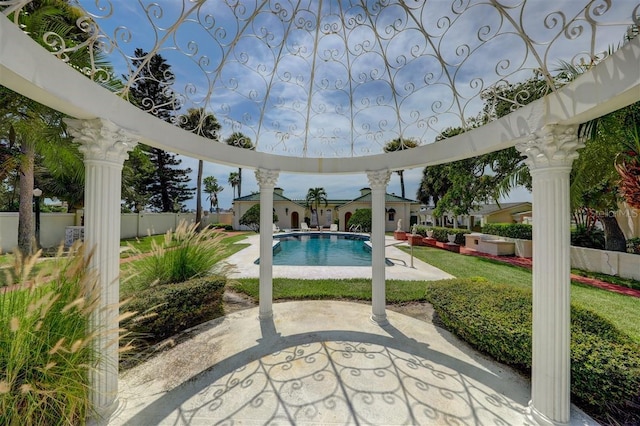 view of pool featuring fence private yard, a fenced in pool, and a patio