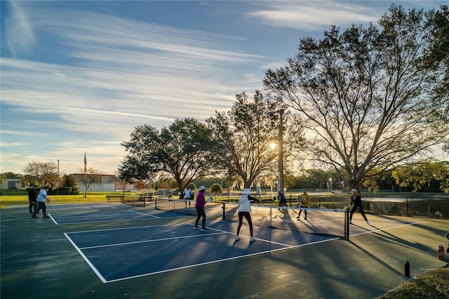 view of sport court with fence
