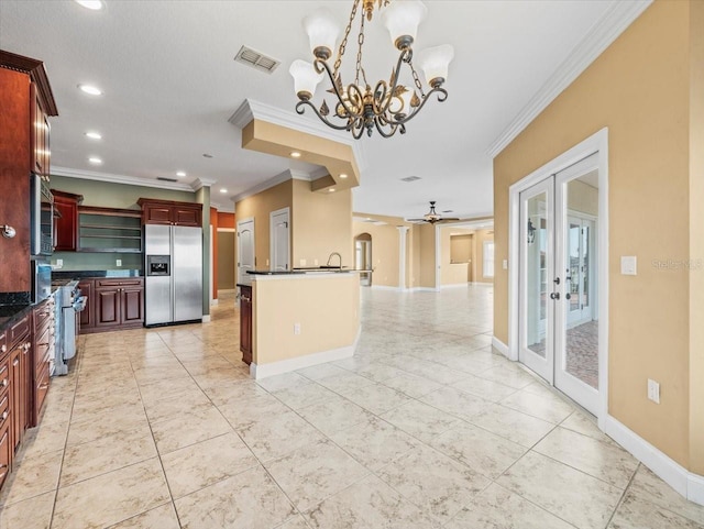 kitchen with visible vents, dark countertops, stainless steel appliances, dark brown cabinets, and french doors