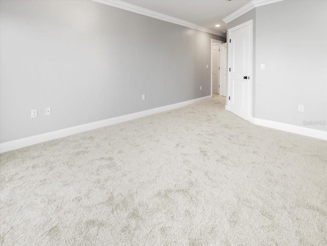 unfurnished room with baseboards, carpet floors, recessed lighting, and crown molding