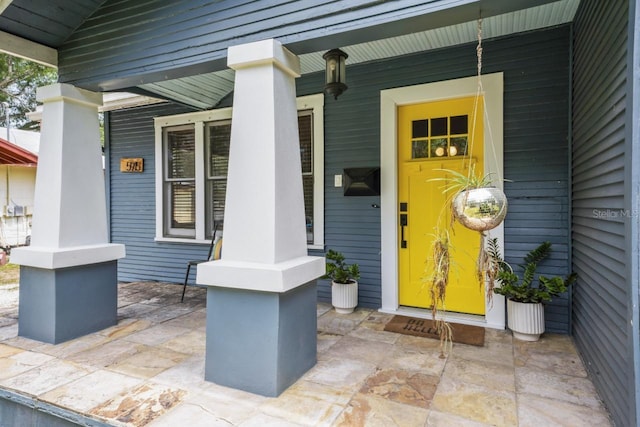 property entrance with a porch