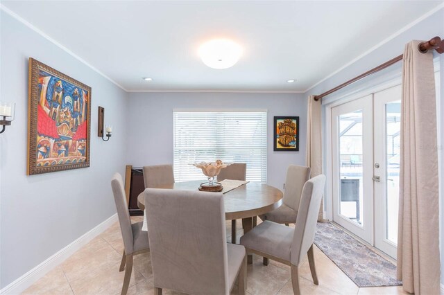 2709 Fairway View Dr, Valrico, FL 33596 - dining room featuring light tile patterned floors, french doors, a wealth of natural light, and baseboards