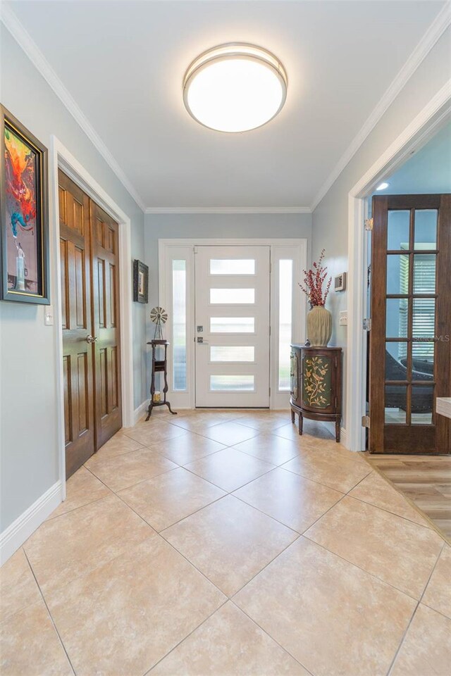 2709 Fairway View Dr, Valrico, FL 33596 - tiled entrance foyer featuring crown molding and baseboards
