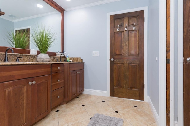 2709 Fairway View Dr, Valrico, FL 33596 - bathroom with ornamental molding, tile patterned flooring, and a sink