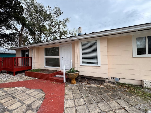 exterior space with a deck and a patio area