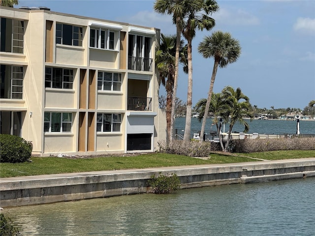 view of property with a water view