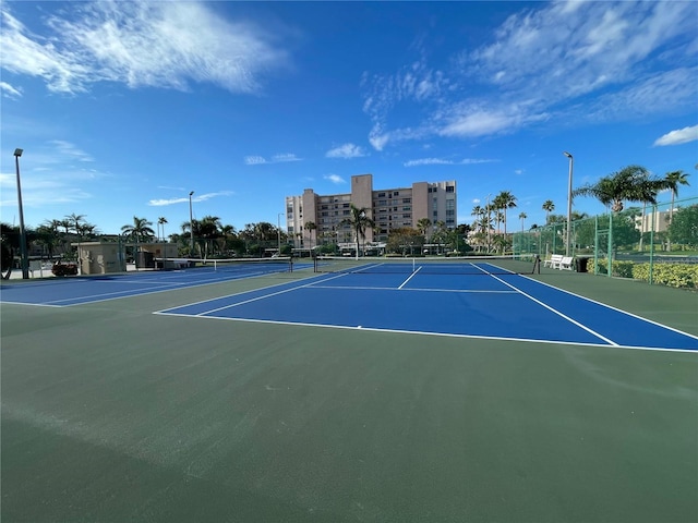 view of sport court featuring community basketball court and fence