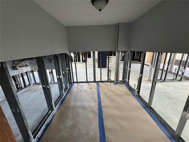 hallway with finished concrete floors