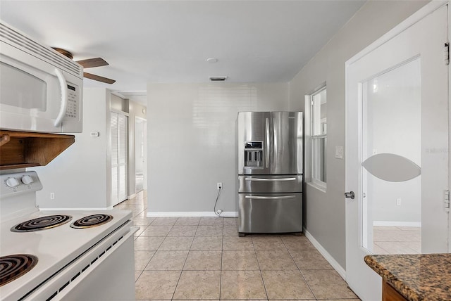 kitchen featuring white appliances, ceiling fan, light tile patterned floors, and visible vents