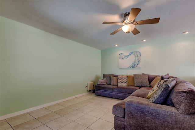 living room featuring light tile patterned floors, baseboards, ceiling fan, and recessed lighting