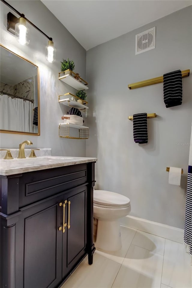 full bathroom featuring visible vents, baseboards, toilet, tile patterned floors, and vanity