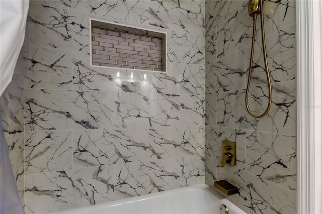 bathroom featuring a combined bath / shower with marble appearance