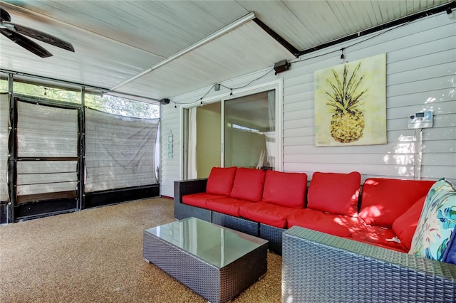 sunroom / solarium with ceiling fan