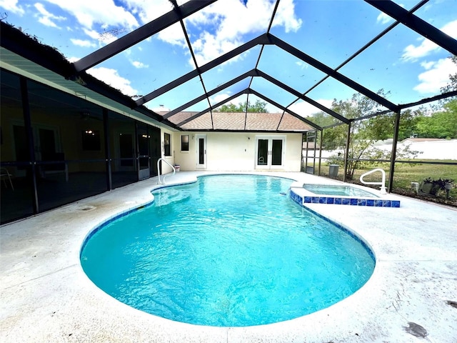 1811 Tawnee Pl, Brandon, FL 33510 - view of swimming pool with french doors, glass enclosure, a pool with connected hot tub, and a patio area
