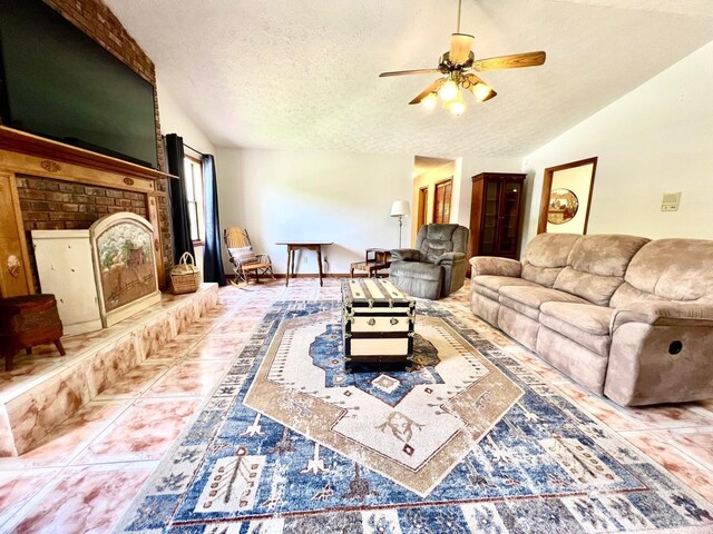 1811 Tawnee Pl, Brandon, FL 33510 - tiled living room featuring lofted ceiling, a textured ceiling, and a ceiling fan