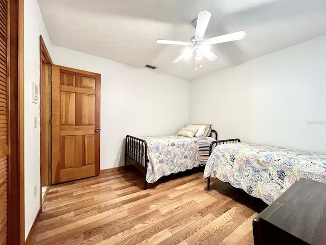 1811 Tawnee Pl, Brandon, FL 33510 - bedroom with visible vents, ceiling fan, and light wood-style flooring