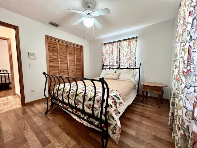 1811 Tawnee Pl, Brandon, FL 33510 - bedroom featuring visible vents, ceiling fan, baseboards, a closet, and light wood finished floors
