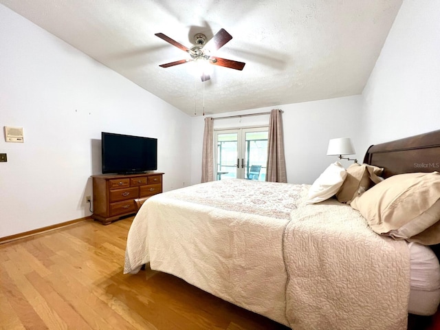 1811 Tawnee Pl, Brandon, FL 33510 - bedroom with a textured ceiling, access to exterior, baseboards, light wood-type flooring, and french doors