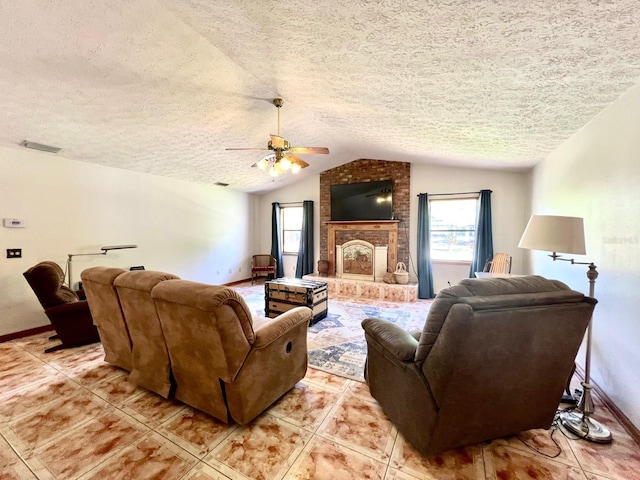 1811 Tawnee Pl, Brandon, FL 33510 - living room featuring lofted ceiling, a textured ceiling, light tile patterned floors, visible vents, and a ceiling fan