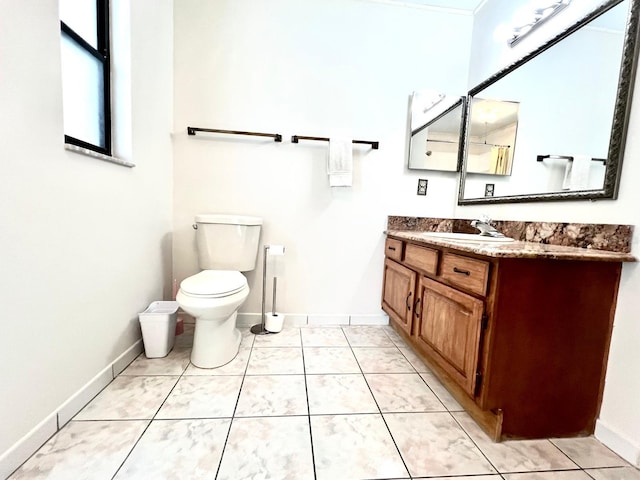1811 Tawnee Pl, Brandon, FL 33510 - bathroom featuring toilet, vanity, and baseboards