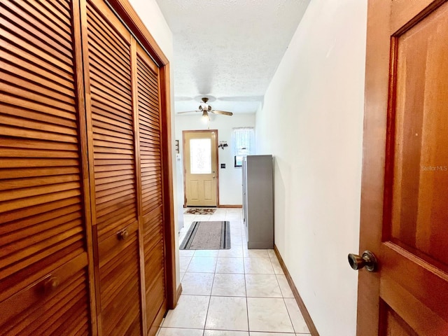 1811 Tawnee Pl, Brandon, FL 33510 - hall featuring a textured ceiling and light tile patterned flooring