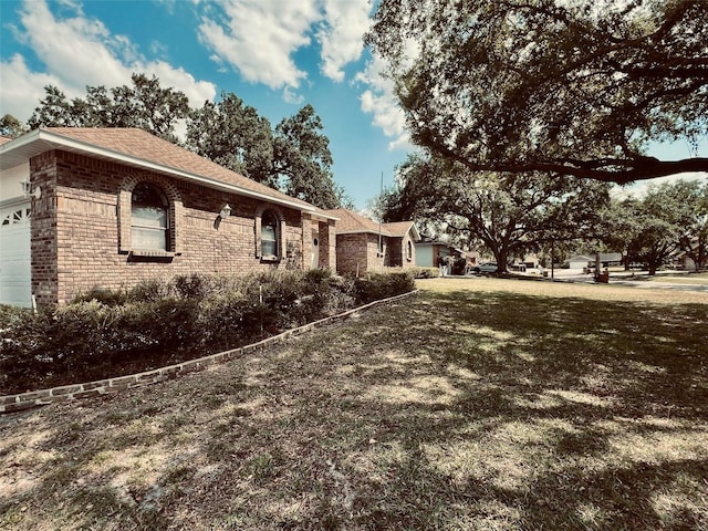1811 Tawnee Pl, Brandon, FL 33510 - view of side of property with a garage and brick siding