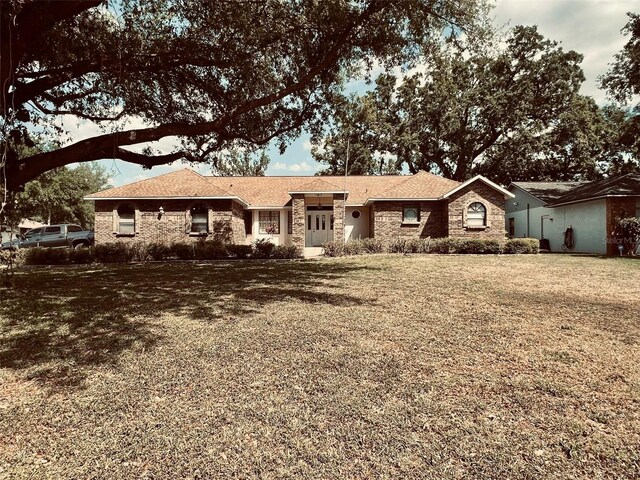 1811 Tawnee Pl, Brandon, FL 33510 - ranch-style house with a front yard