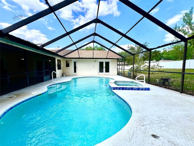 1811 Tawnee Pl, Brandon, FL 33510 - view of swimming pool featuring a lanai, a patio area, french doors, and a pool with connected hot tub