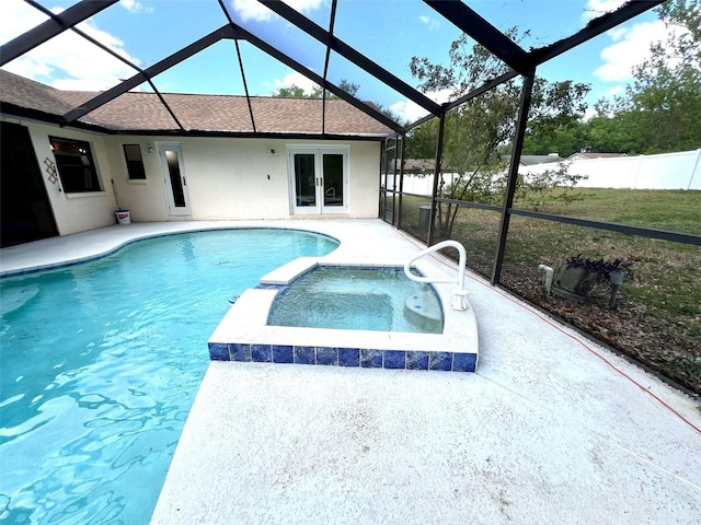 1811 Tawnee Pl, Brandon, FL 33510 - view of pool featuring a patio area, a lanai, fence, french doors, and a pool with connected hot tub