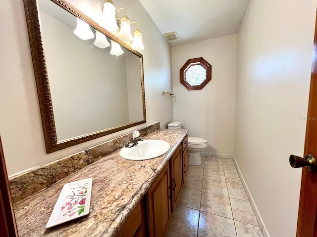 1811 Tawnee Pl, Brandon, FL 33510 - half bathroom with tile patterned flooring, toilet, vanity, baseboards, and visible vents