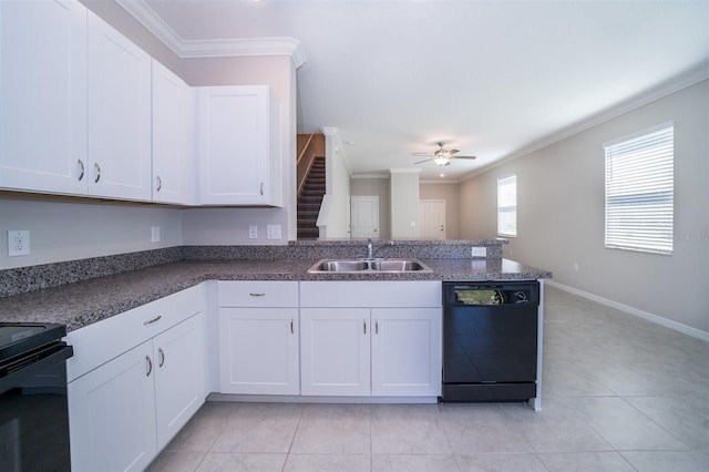 kitchen with crown molding, white cabinetry, a sink, and black appliances