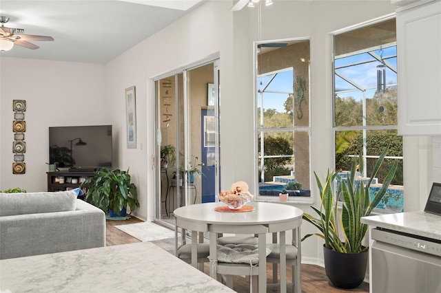 dining area featuring a ceiling fan