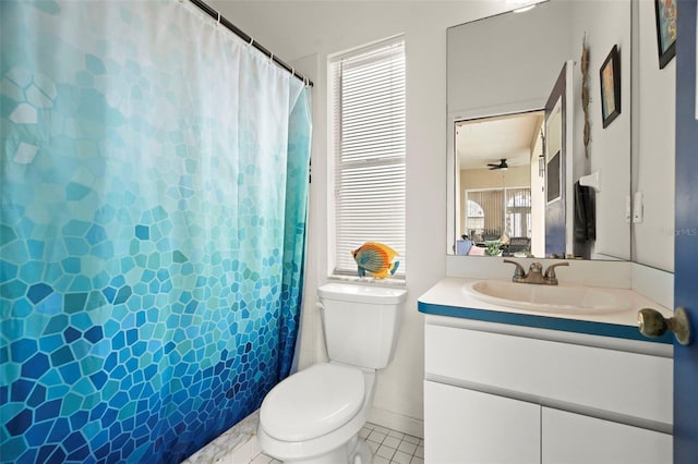 bathroom featuring a ceiling fan, toilet, a shower with curtain, tile patterned floors, and vanity