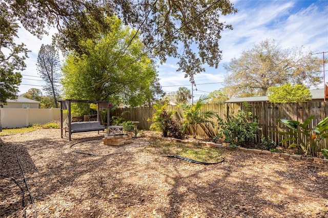 view of yard featuring a fenced backyard