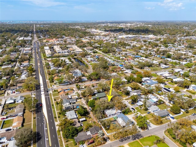 birds eye view of property with a residential view