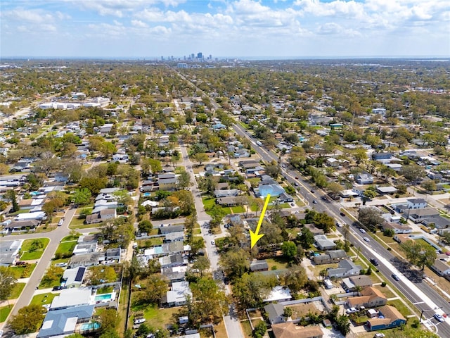 birds eye view of property with a residential view