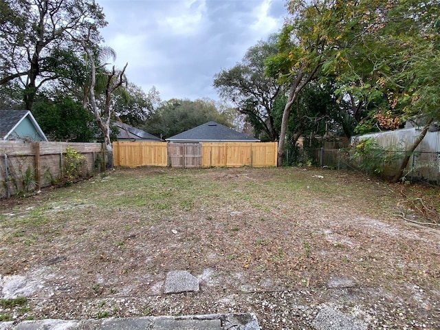 view of yard featuring a fenced backyard