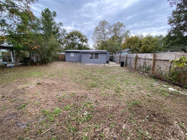 view of yard featuring a fenced backyard