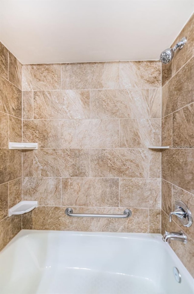 full bath featuring  shower combination